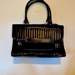 Ted Baker at his best! Patten leather handbag.